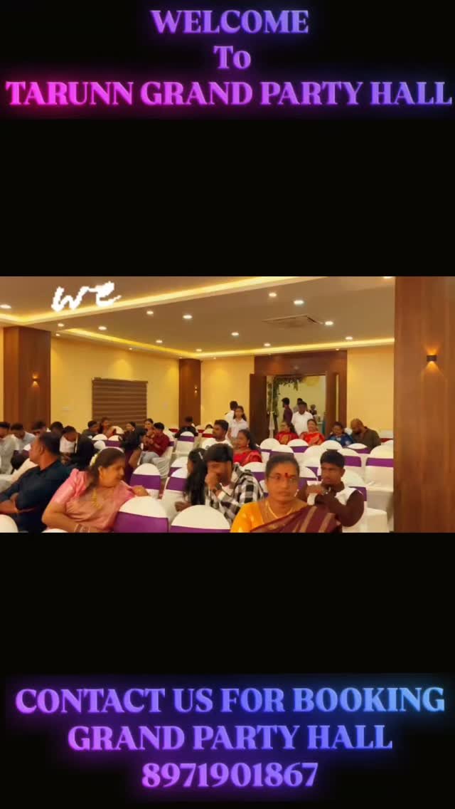 Guests seated in the hall under a welcome banner for the family