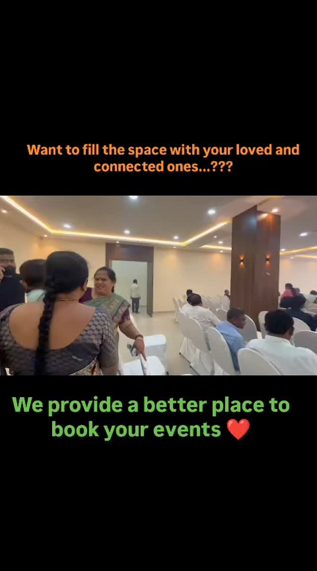 Wide walk-through of the hall set with white chairs for a function